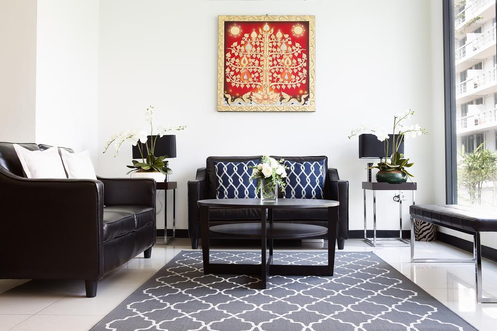 The Capital Resort @ Sukhumvit 50 방콕 외부 사진 A living room in a condominium